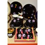 THIRTY FIVE PIECES OF PALISSY ORCHID TEAWARES, decorated with pink orchid flowers on a black ground,