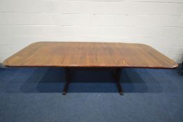 IN THE MANNER OF JENSEN FROKJAER OF DENMARK, A ROSEWOOD EXTENDING TABLE, with two additional leaves,