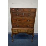 A MAHOGANY CHEST ON STAND, the Georgian top sections with two short over three long graduated