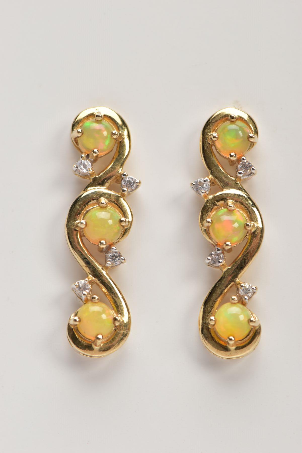 A PAIR OF 9CT GOLD, OPAL DROP EARRINGS, each drop set with three circular opal cabochons, and four