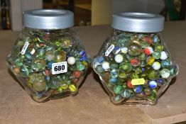 TWO LIDDED GLASS JARS, CONTAINING MARBLES, assorted sizes, colours and styles, includes some ball