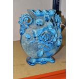 A LATE 19TH CENTURY TWIN HANDLE BLUE GLAZED VASE, with frit and applied foliate decoration, the base