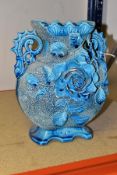 A LATE 19TH CENTURY TWIN HANDLE BLUE GLAZED VASE, with frit and applied foliate decoration, the base