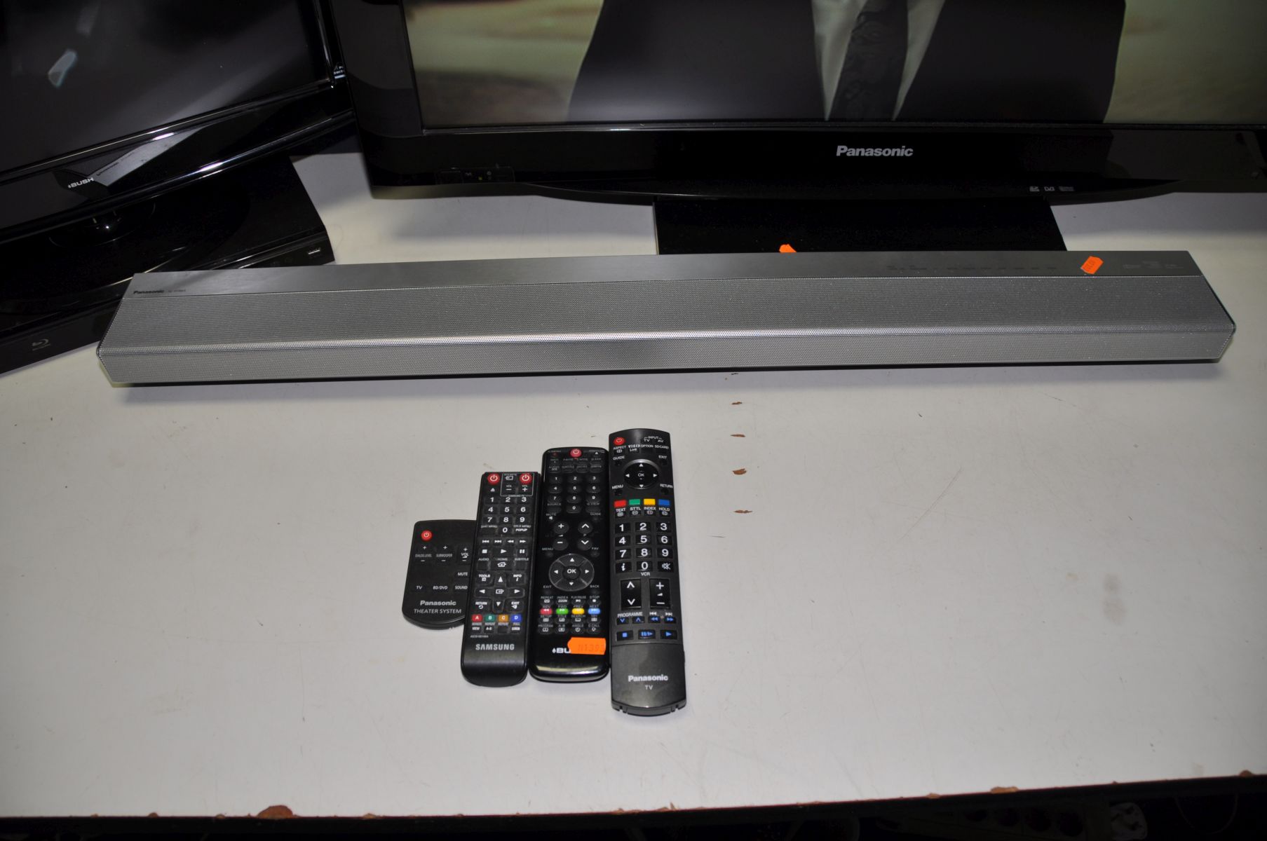 A PANASONIC TX-37LZD81 37in TV with a Bush A322D 22in TV, a Samsung DVD player and a Panasonic SC- - Image 3 of 3