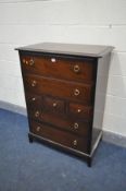 A STAG MINSTREL CHEST OF SEVEN DRAWERS, width 82cm x depth 46cm x height 113cm