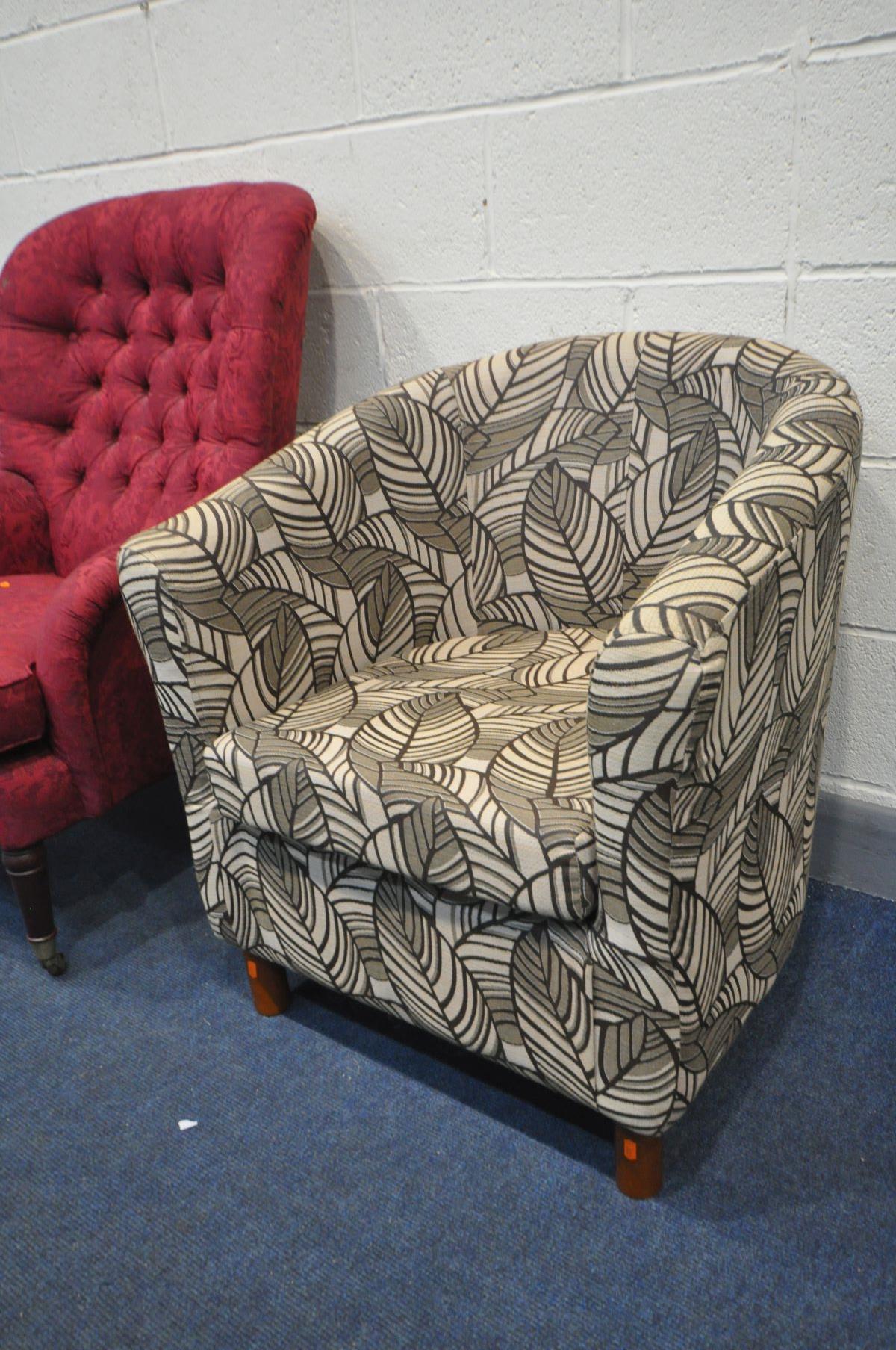 A PARKER KNOLL BUTTONED RED UPHOLSERED ARMCHAIR, on brass caps and casters, along with a floral - Image 3 of 3