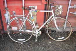 A WHITE FALCON CYCLES PHANTOM ROAD BIKE, with rear luggage rack and 23 inch frame