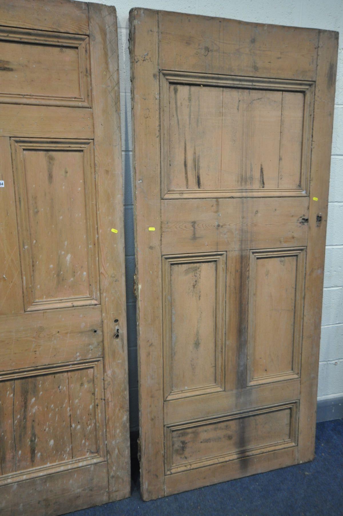 THREE VARIOUS VICTORIAN PINE PANELLED SCHOOLHOUSE DOORS, one with handle, two doors approximately, - Image 2 of 4