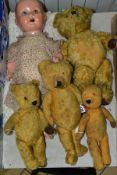 A WELL LOVED MERRYTHOUGHT GOLDEN PLUSH TEDDY BEAR, is missing both eyes, has shaved muzzle with