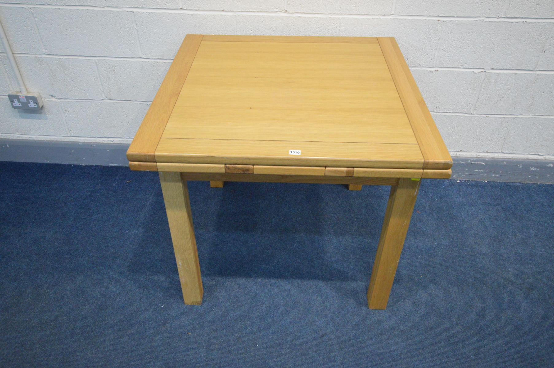 A LIGHT OAK CROSSBANDED DRAW LEAF TABLE on block legs, closed width 90cm x open width 160cm x height - Image 4 of 4