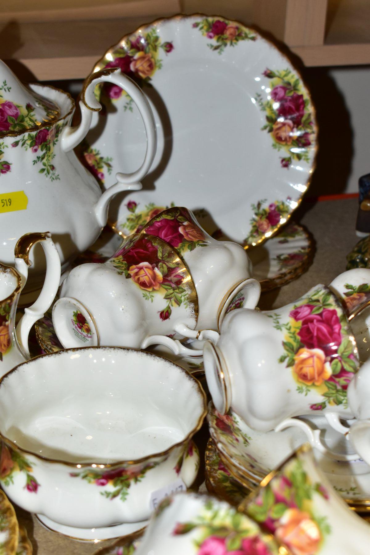 AN EIGHTY ONE PIECE ROYAL ALBERT OLD COUNTRY ROSES TEASET, comprising a teapot (second with chip and - Image 6 of 8