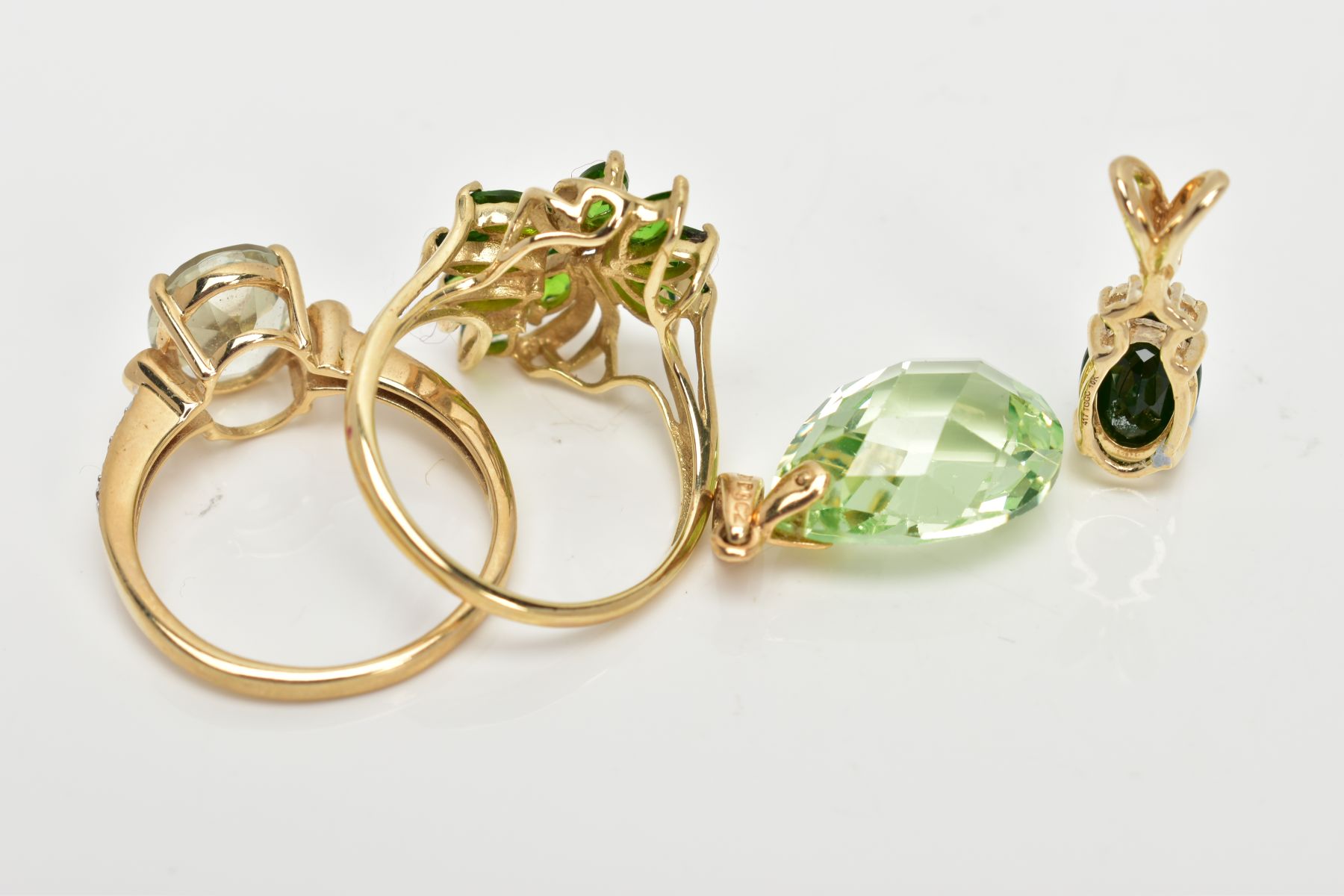 TWO 9CT GOLD GEM SET RINGS AND TWO YELLOW METAL PENDANTS, to include an eleven stone floral dress - Image 3 of 3