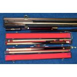 THREE CASED SNOOKER CUES AND CUE EXTENDERS, comprising Knight by Burroughes and Watts, a C.C. Ltd