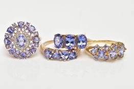 FOUR 9CT GOLD TANZANITE RINGS, to include a three stone tanzanite ring, oval cut, prong set,