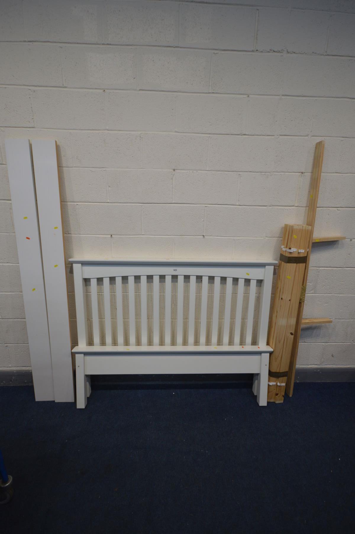 A MODERN WHITE FINISH 4FT6 BEDSTEAD, with side rails, pine slats and bolts