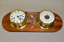 A PAIR OF SCHATZ BRASS CASED SHIPS CLOCK AND COMPENSATED PRECISION BAROMETER, white painted dials,