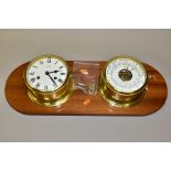 A PAIR OF SCHATZ BRASS CASED SHIPS CLOCK AND COMPENSATED PRECISION BAROMETER, white painted dials,