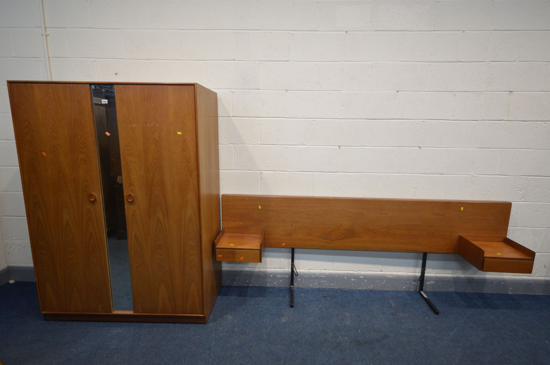 A MID CENTURY MEREDEW TEAK 5FT HEADBOARD/BEDSIDES, with single drawers, overall length 240cm, and