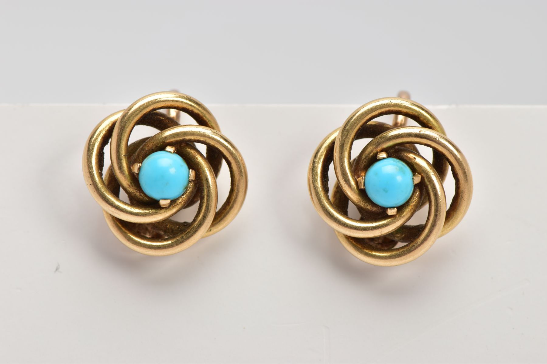 A PAIR OF EARRINGS, of interlocking circular design each set with a central turquoise cabochon, with - Image 2 of 3