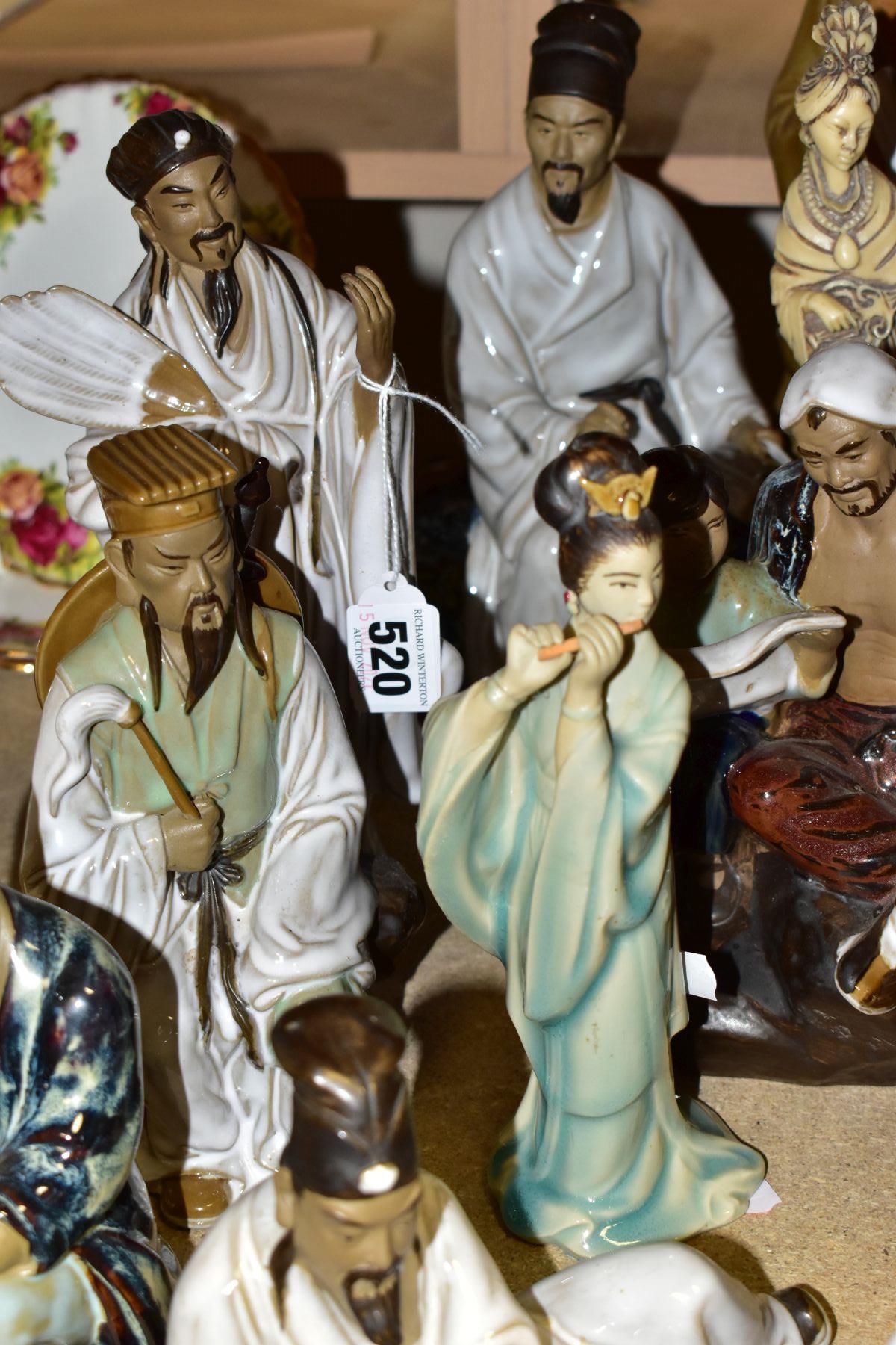 A GROUP OF MODERN ORIENTAL FIGURINES, to include fifteen figurines featuring people reading, fishing - Image 4 of 12