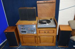 A VINTAGE ROTEL COMPONANT HI FI in an oak cabinet comprising of a RP 510 turntable (works as