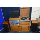 A VINTAGE ROTEL COMPONANT HI FI in an oak cabinet comprising of a RP 510 turntable (works as