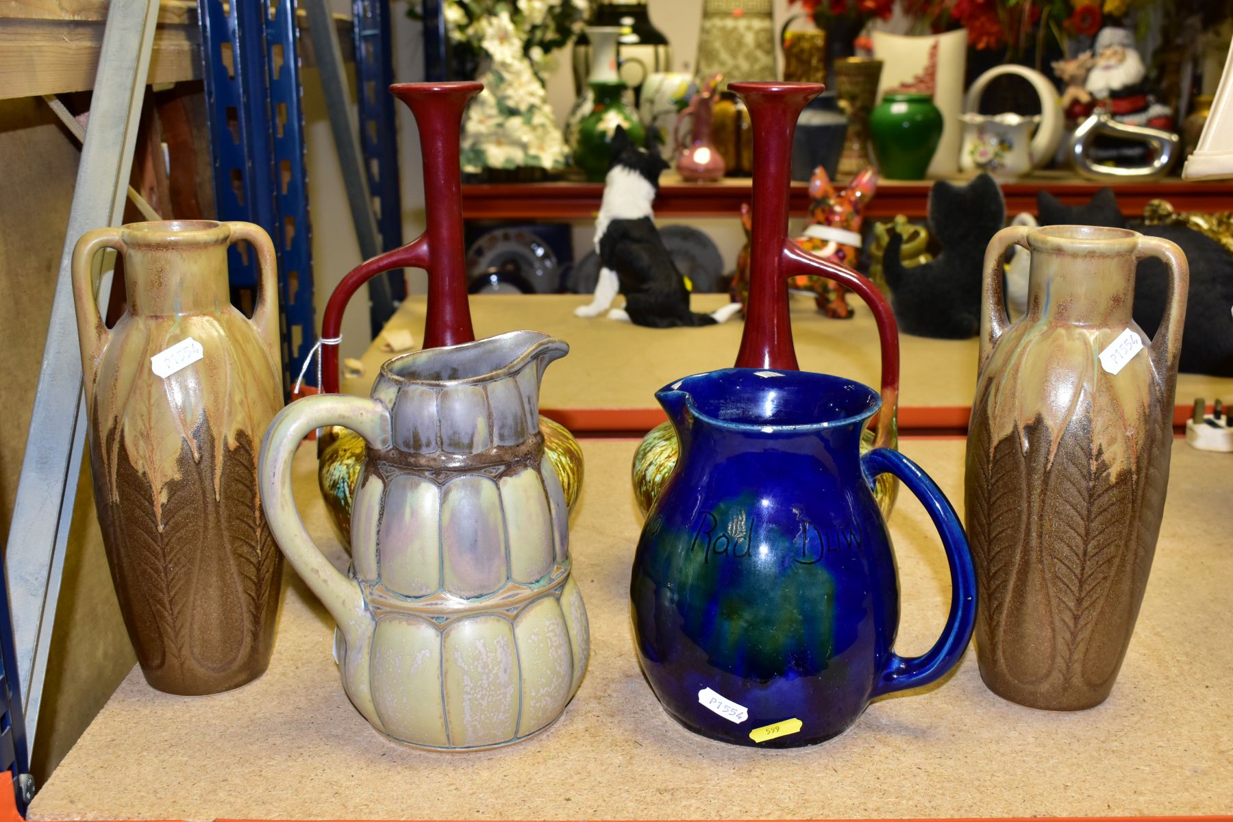 SIX CERAMIC VASES AND JUGS, comprising a pair of twin handle French Denbac vases with relief leaf