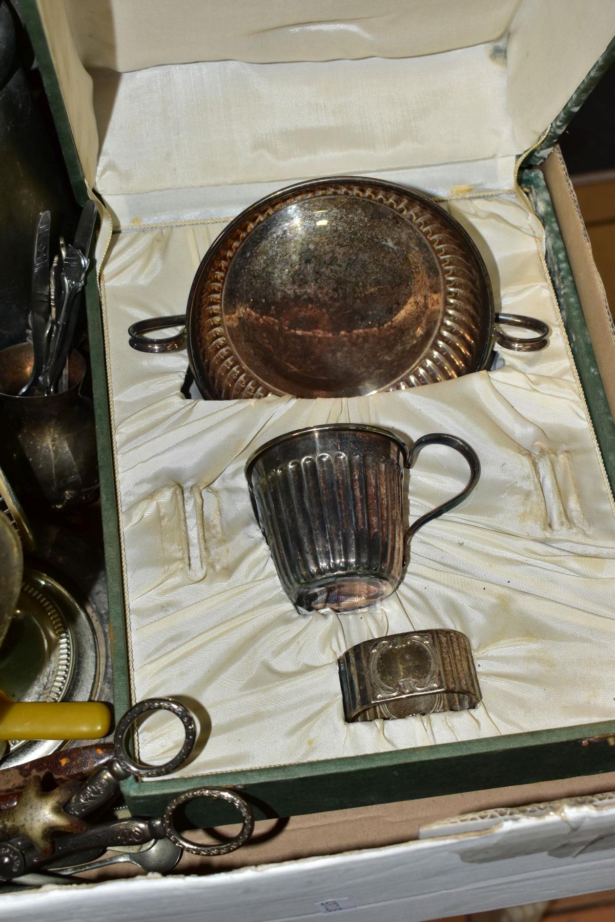 TWO BOXES OF METALWARES, to include a cased EPNS part christening set, two trench art jugs, height - Image 2 of 5