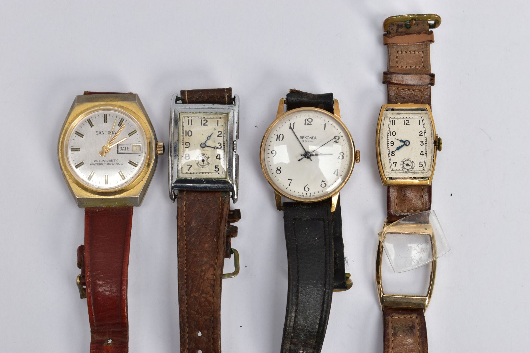 FOUR WRISTWATCHES, to include an early 20th century watch with 9ct gold head and tan leather