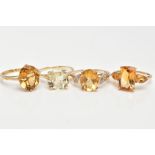 FOUR 9CT GOLD DRESS RINGS, various designs such as an oval cut citrine, an oval cut citrine