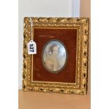 TWO CIRCA 20TH CENTURY MINIATURE OVAL OIL PORTRAITS OF LADIES, set within velvet and gilt gesso