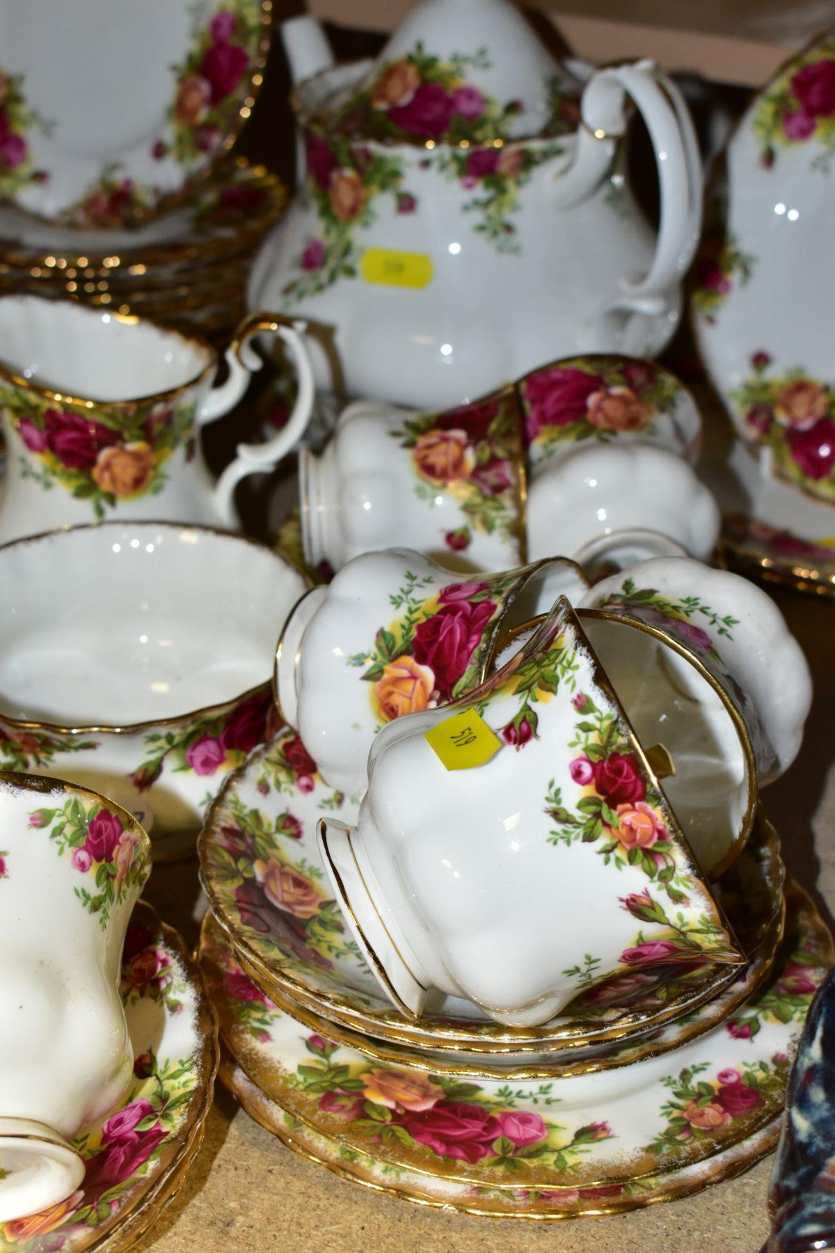 AN EIGHTY ONE PIECE ROYAL ALBERT OLD COUNTRY ROSES TEASET, comprising a teapot (second with chip and - Image 7 of 8