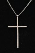 A 9CT WHITE GOLD, DIAMOND CROSS PENDANT AND CHAIN, the thin cross pendant set with single cut