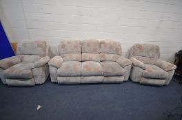 AN UPHOLSTERED ELECTRIC LOUNGE SUITE, comprising a three seater settee and a pair of armchairs (