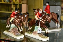 THREE HERTWIG CERAMIC HORSES, comprising a girl jumping a fence, a boy jumping a fence and a