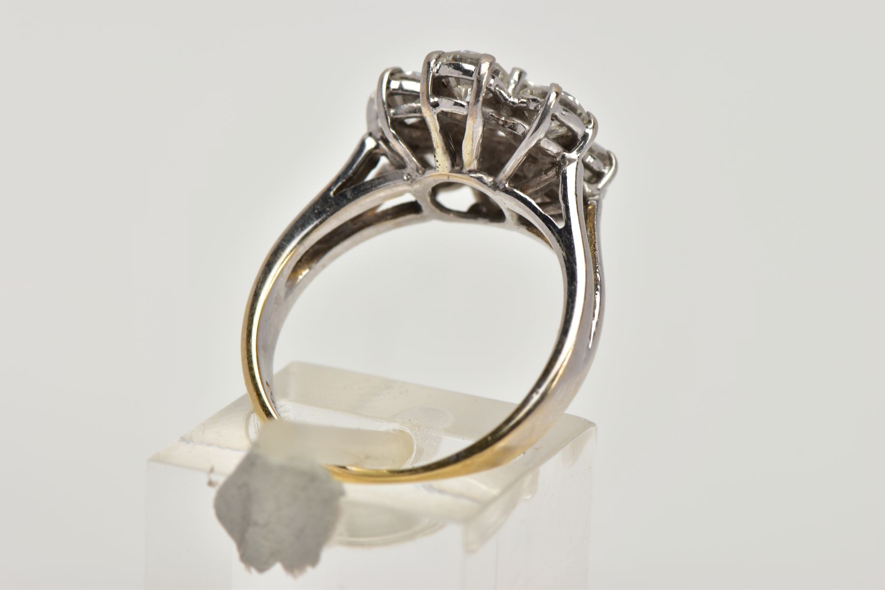 AN 18T WHITE GOLD SEVEN STONE DIAMOND CLUSTER RING, designed as seven claw set brilliant cut - Image 3 of 5