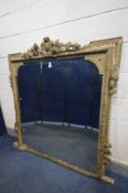A 19TH CENTURY FRENCH LOUIS XVI STYLE GILTWOOD OVERMANTLE MIRROR, the plate within a frame with