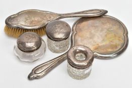 A SELECTION OF SILVER VANITY ITEMS, to include an early 20th century silver hand mirror and brush