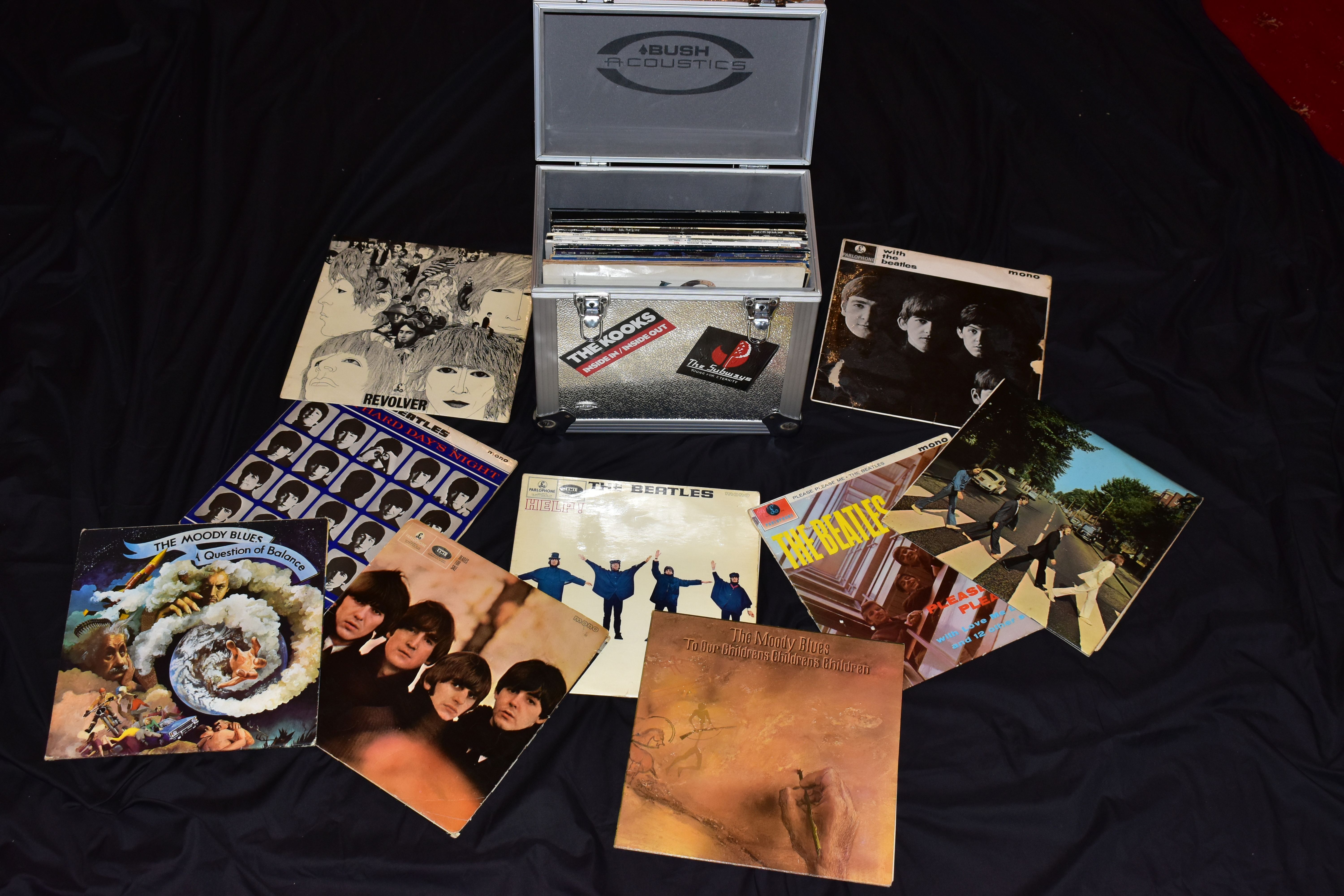 AN ALUMINIUM LP CASE CONTAINING THIRTY EIGHT LPS AND SINGLES by artist including The Beatles , The