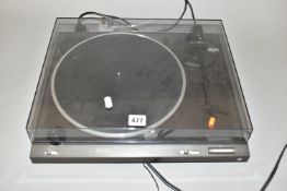 A TECHNICS SL-B210 TURNTABLE, drives and tracks record ( PAT pass and working)