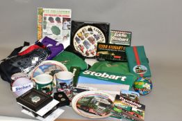 A QUANTITY OF ASSORTED EDDIE STOBART MEMORABILIA, to include Wade Money Box, collectors plates, most