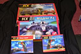 TWO BOXED SCX ELECTRIC RACING SETS, McLaren F1, No.80510 and Rally Australia, No.80530, contents not