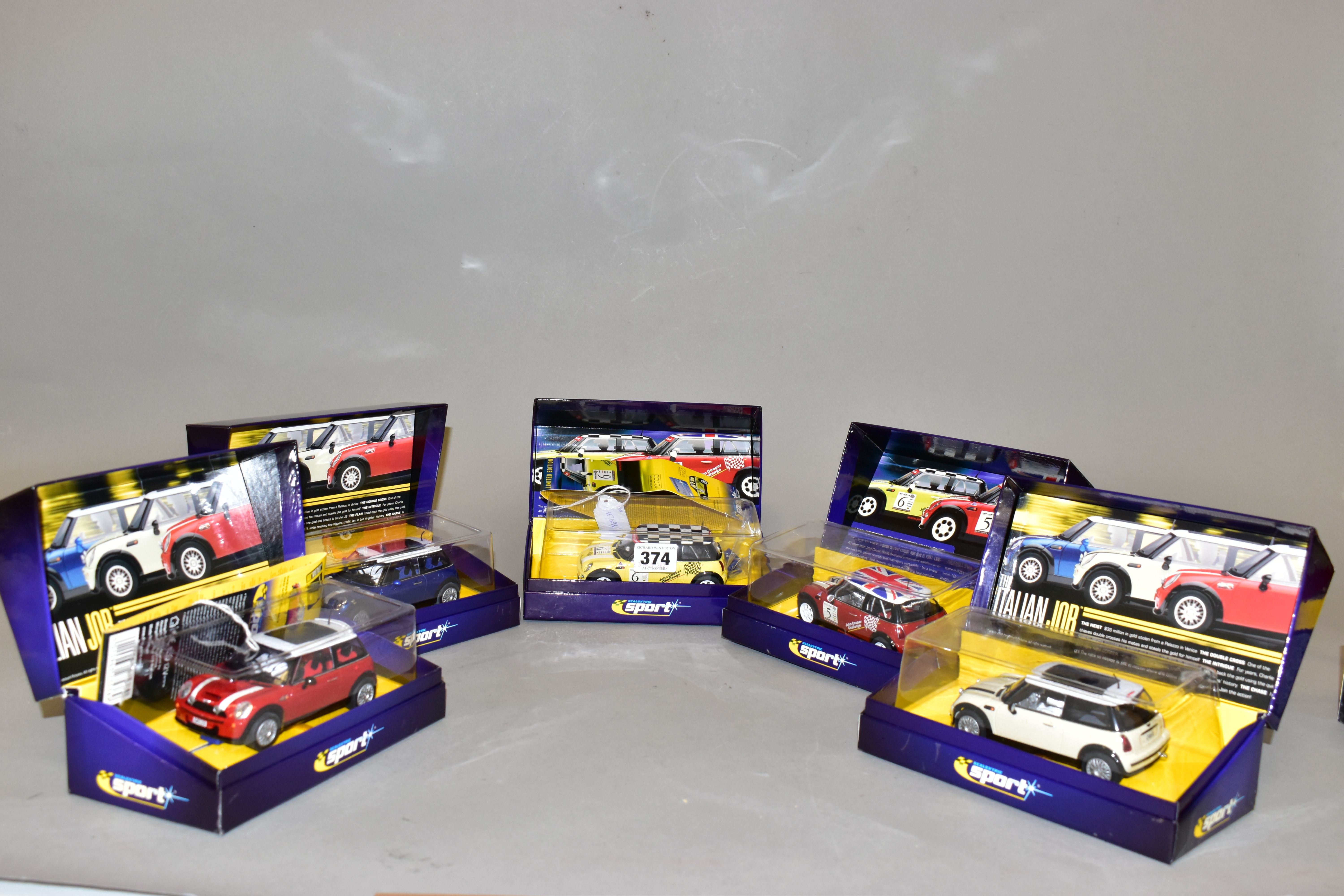 THREE BOXED SCALEXTRIC SPORT LIMITED EDITION THE ITALIAN JOB MINI COOPER S CARS, red (C2538A), white