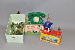 A BOXED TRI-ANG CLOCKWORK PLASTIC MECHANICAL RINGING TELEPHONE, No.293, green plastic telephone with
