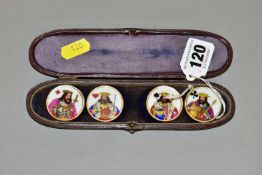 A CASED SET OF FOUR LATE 19TH CENTURY CIRCULAR PORCELAIN GAMING COUNTERS, each printed and tinted