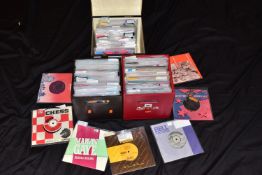 THREE CASES CONTAINING OVER TWO HUNDRED AND FORTY 7in SINGLES AND EPs from artists such as The Beach