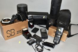 A TRAY CONTAINING NIKON CAMERA EQUIPMENT including a boxed SB600 flash, a boxed SB-28 flash, a Boxed