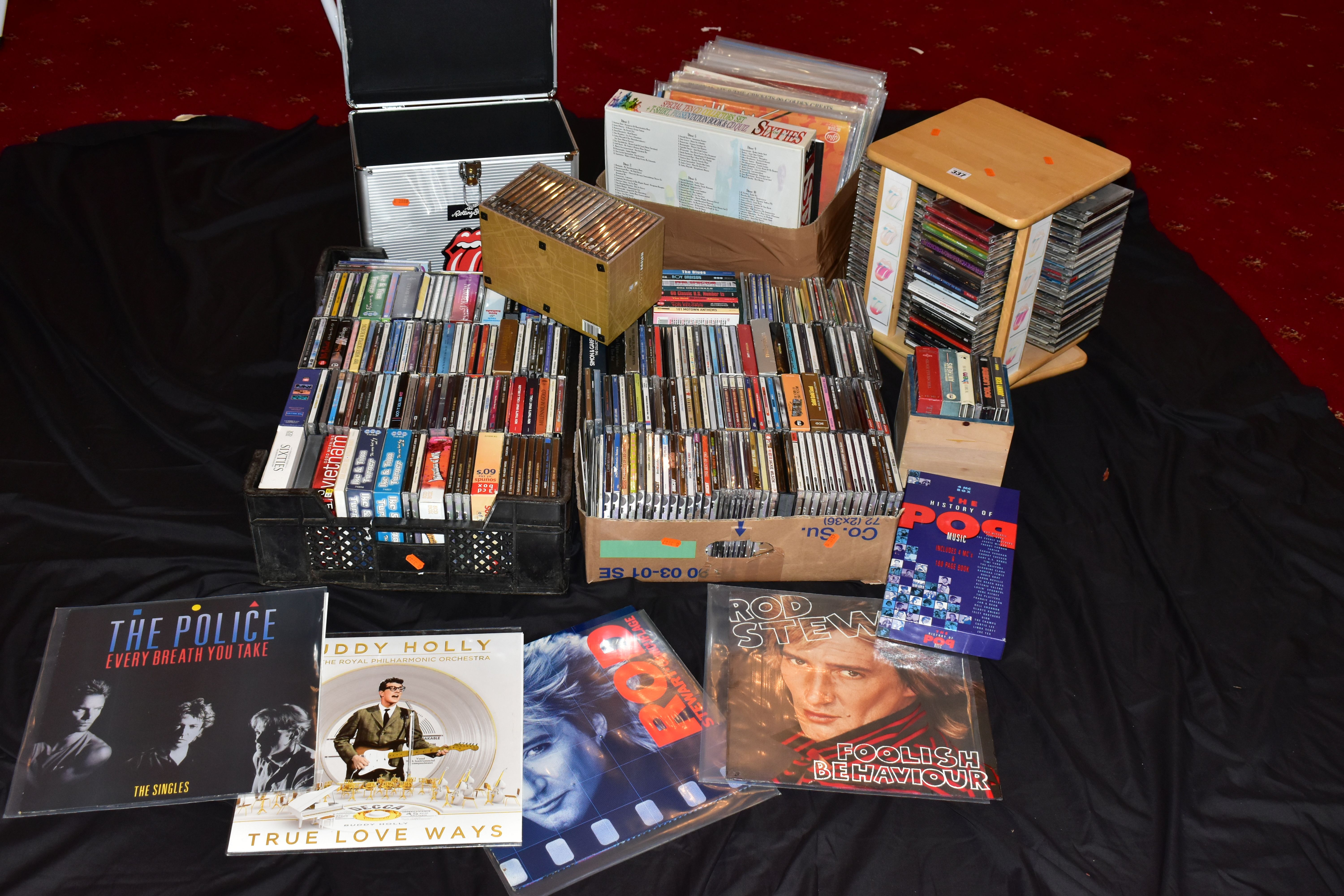 THREE TRAYS AND A CAROUSEL CONTAINING OVER FIFTY LPs AND ONE HUNDRED CDs from artists such as The