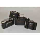 FOUR ZEISS IKON FOLDING CAMERAS comprising od a Super Ikonta 530/2, a Super Ikonta 532/16 in leather