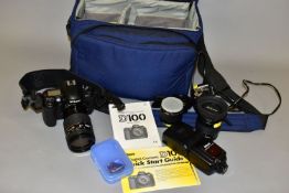 A NIKON D100 DIGITAL SLR CAMERA with charger, one good battery and a discharged battery, a Nikkor AF